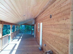 Stain rough cedar siding and clear coat all T&G Soffit in Plain, WA