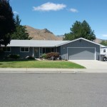 Wenatchee Residential Repaint Two Tone Description: Exterior: Remove all failing paint, apply Peel Bond primer on all exposed surfaces, paint body with soffit in second color.